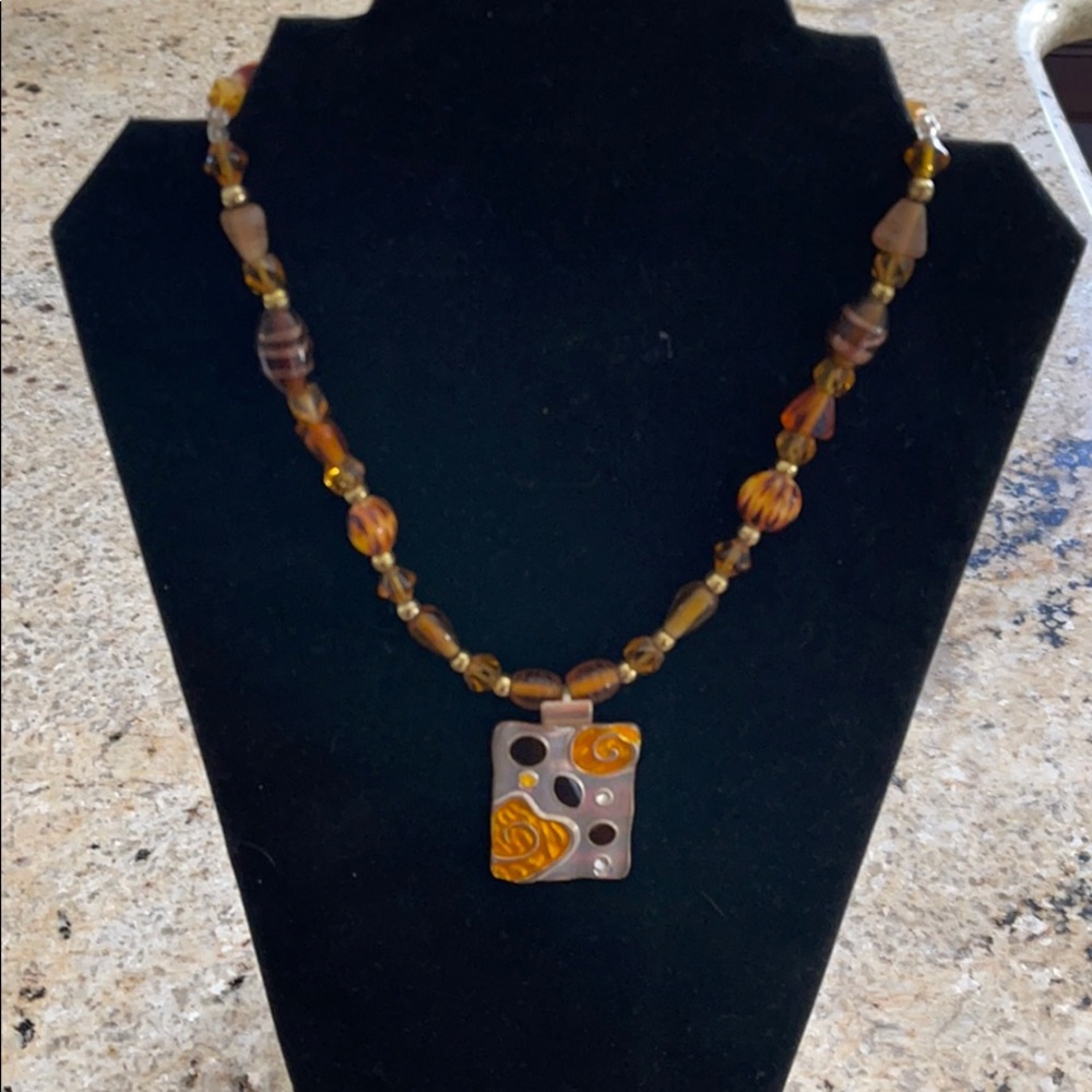 Gold and mustard color beaded necklace